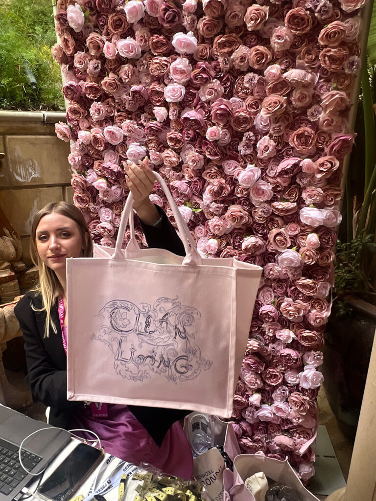 Woman holding Clean Living Gift Bag