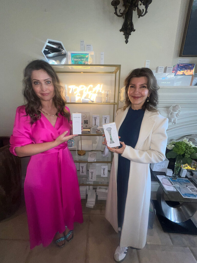 Two women holding up packages of Lunaescent