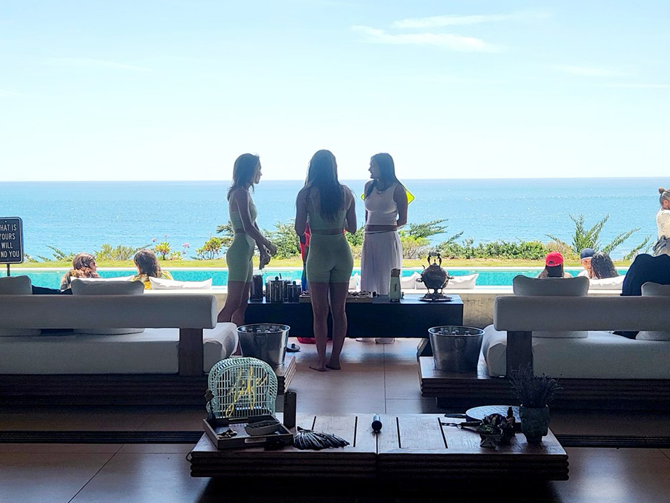 Dripology Wellness Day 3 Women Three Women looking at the scene from Malibu at Dripology Wellness Day