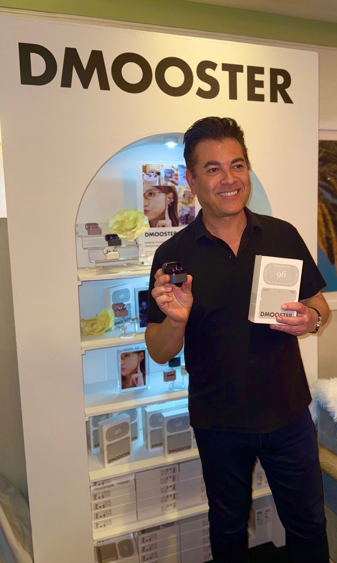 Man holding DMooster Audio Products