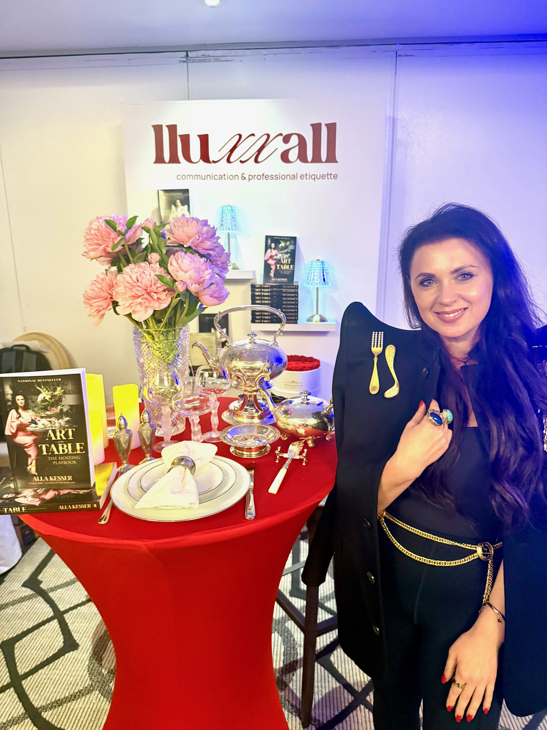 Alla Kesser Gross in front of Lluxxall Booth